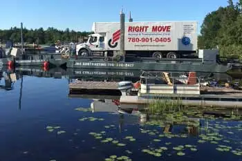 Loading our moving truck onto the ferry.