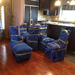 Protecting chairs with our moving blankets. Protecting chairs with our moving blankets.